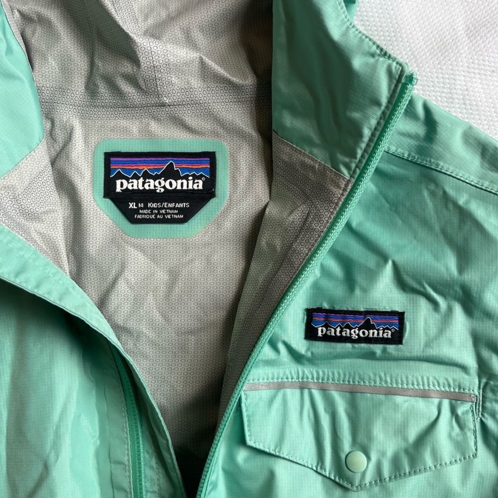 Girls’ Turquoise Patagonia rain jacket